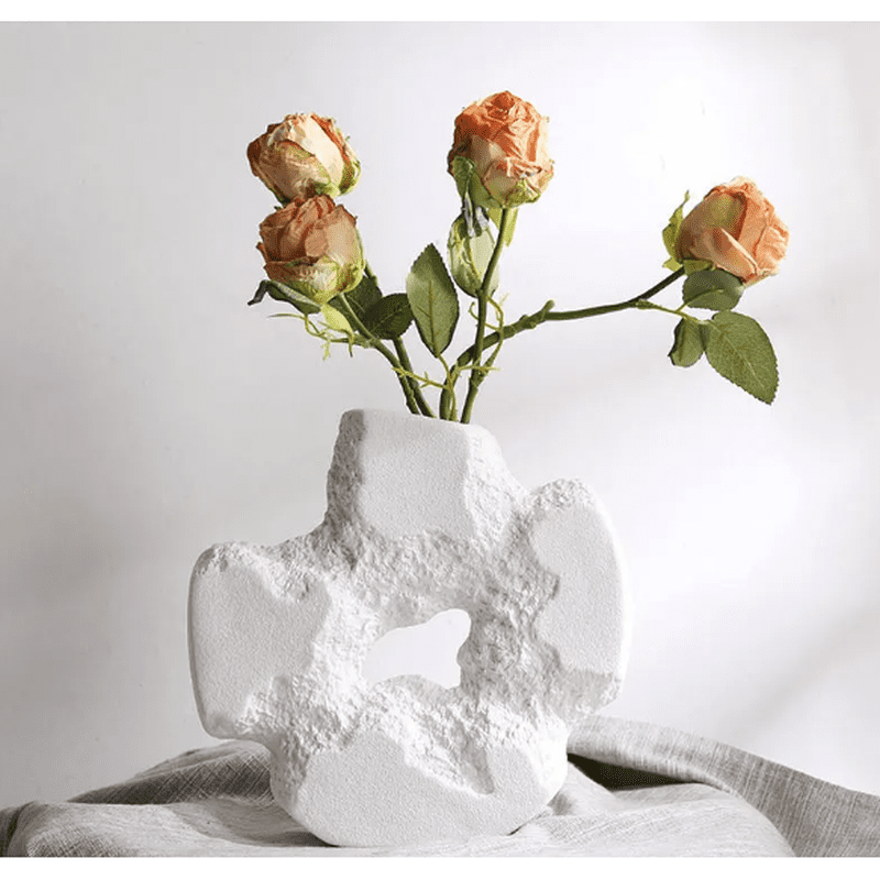 Handcrafted Ceramic Stone Vase: Unique Irregular Hollow-Out Floral Decor